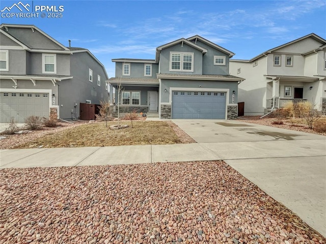 view of front facade with stucco siding, an attached garage, a residential view, stone siding, and driveway