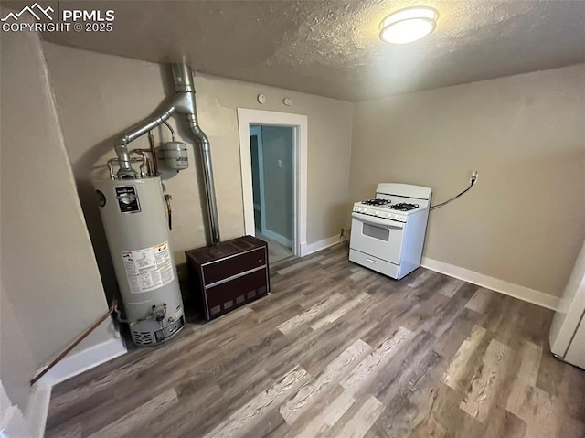 utility room featuring water heater