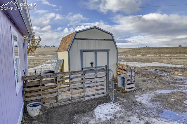 view of outbuilding featuring a rural view