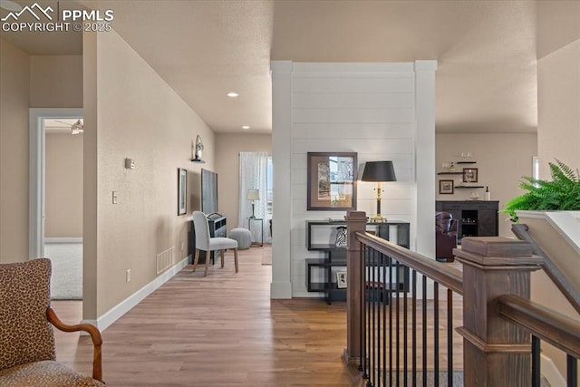 hallway featuring light hardwood / wood-style flooring