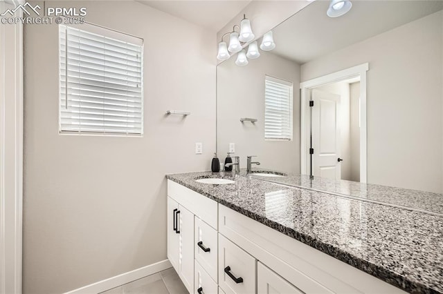 bathroom with vanity and tile patterned floors