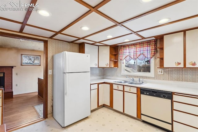 kitchen with open shelves, light countertops, a sink, white appliances, and coffered ceiling