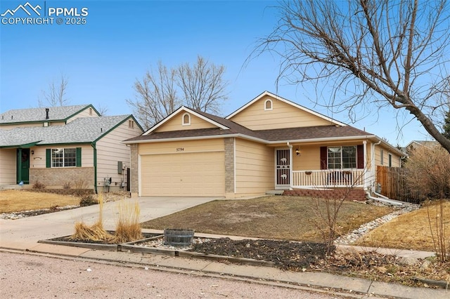 ranch-style house featuring covered porch, brick siding, driveway, and an attached garage