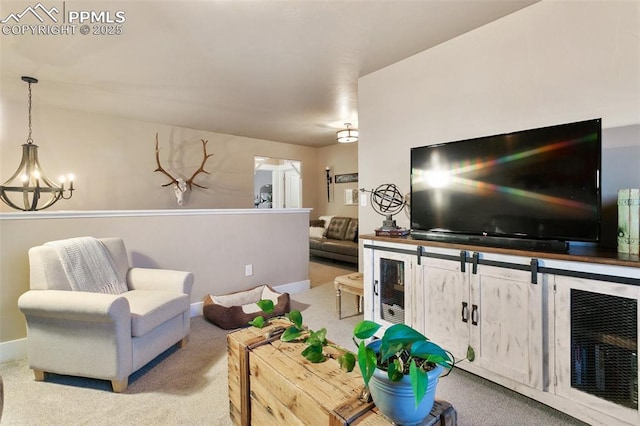 living area with a chandelier, light carpet, and baseboards