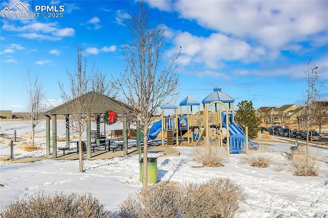 snow covered playground featuring playground community