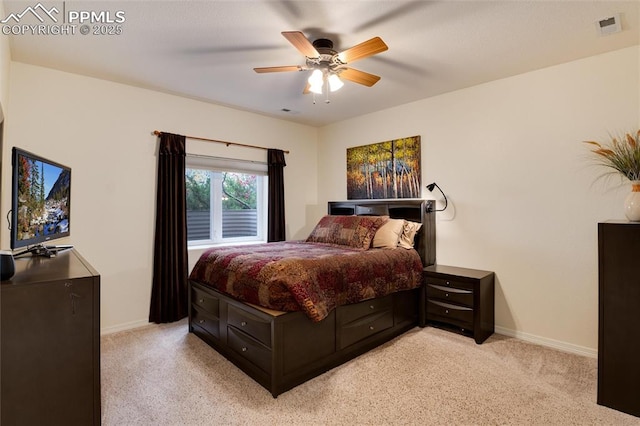 bedroom with ceiling fan, light colored carpet, visible vents, and baseboards