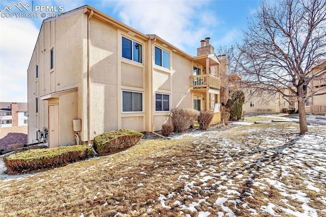 view of snow covered property