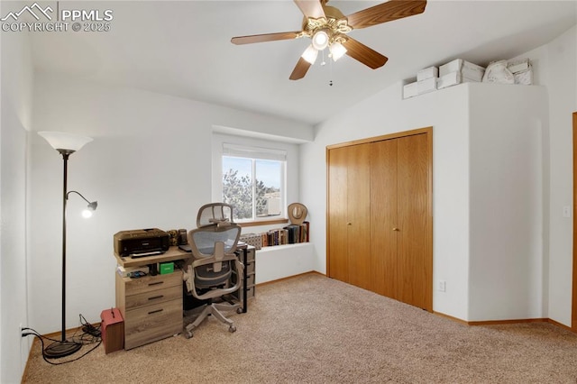 office featuring lofted ceiling, baseboards, a ceiling fan, and carpet flooring