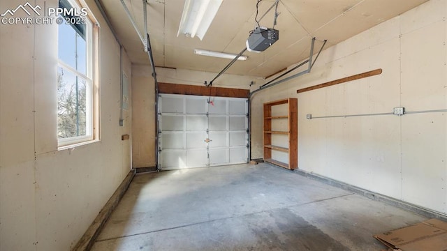 garage featuring a garage door opener