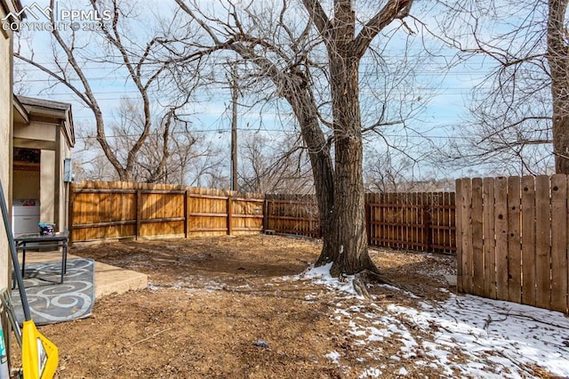 view of yard featuring a fenced backyard