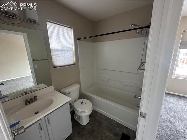 bathroom with toilet, shower / tub combination, and vanity