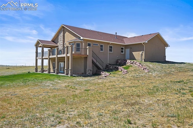 rear view of property with a lawn, a patio, stairway, a deck, and stucco siding