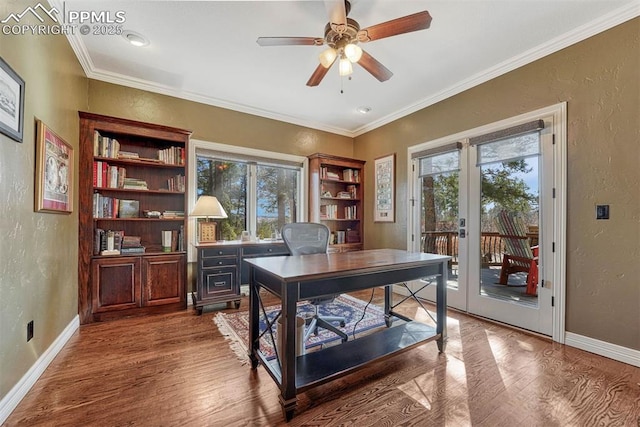 office space featuring ornamental molding, french doors, a textured wall, and wood finished floors