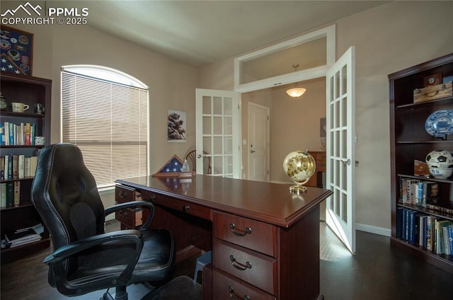 office area with french doors, dark wood finished floors, and baseboards