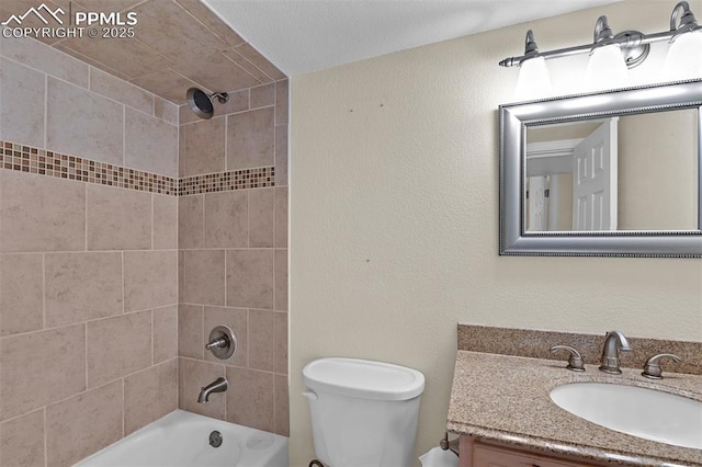 full bathroom featuring toilet, washtub / shower combination, and vanity