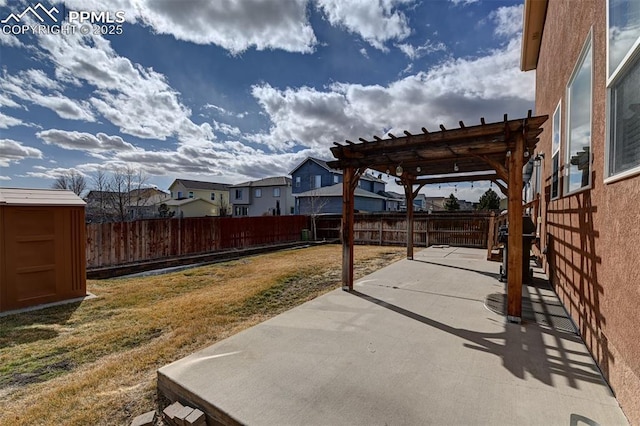 view of patio with a residential view, a fenced backyard, and a pergola