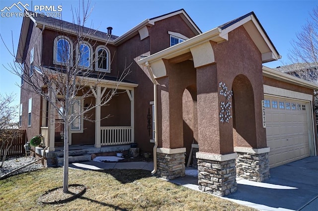 view of front facade featuring covered porch, a front lawn, a garage, and stucco siding