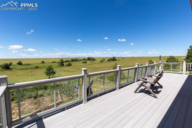 deck featuring a rural view