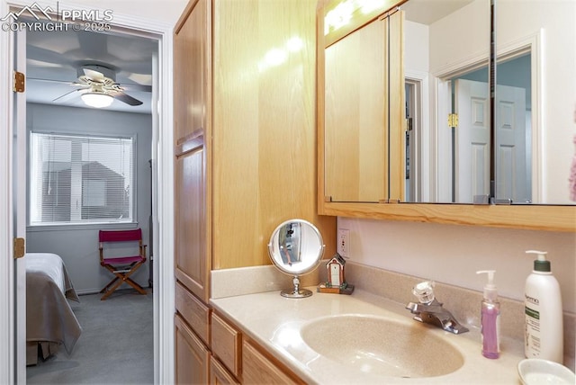 ensuite bathroom featuring ensuite bath, ceiling fan, and vanity