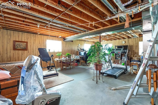 workout room with wood walls