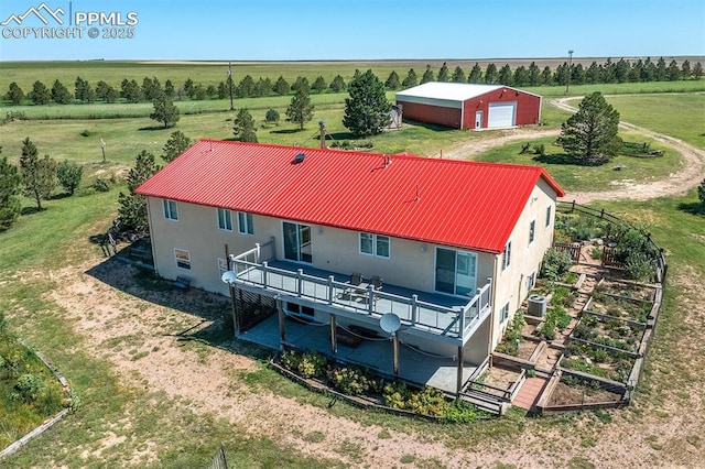 birds eye view of property featuring a rural view