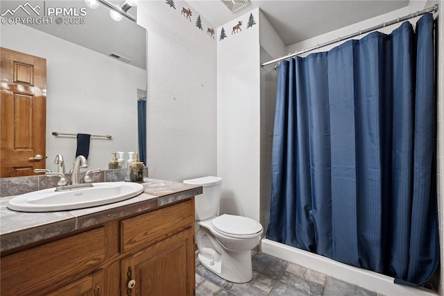 bathroom with toilet, vanity, visible vents, and a shower with curtain