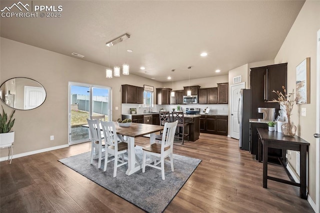 dining area with dark wood finished floors, recessed lighting, baseboards, and visible vents