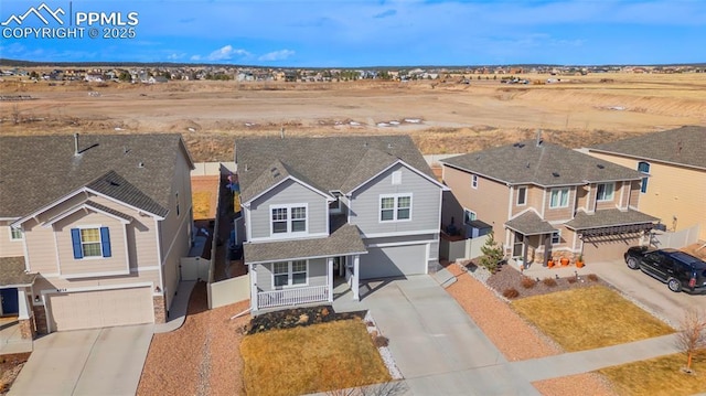 drone / aerial view with a residential view