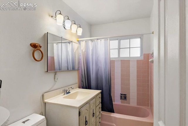 full bath with shower / bathtub combination with curtain, toilet, and vanity