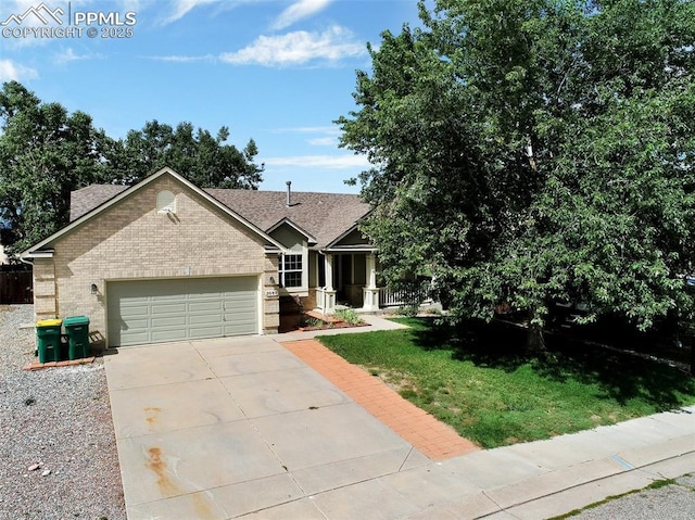 view of front of home featuring an attached garage, brick siding, concrete driveway, roof with shingles, and a front yard