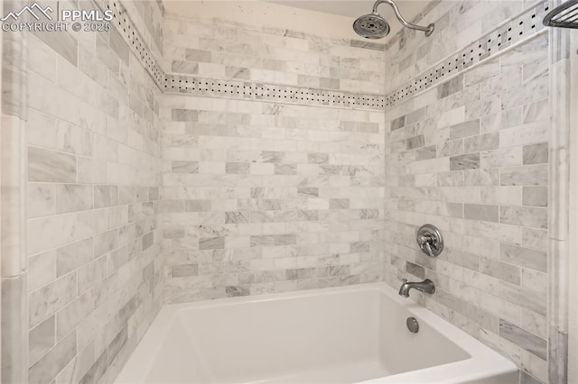 bathroom with tub / shower combination