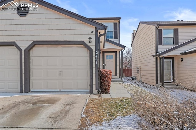 view of front of house featuring driveway and an attached garage