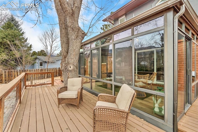 deck featuring a sunroom