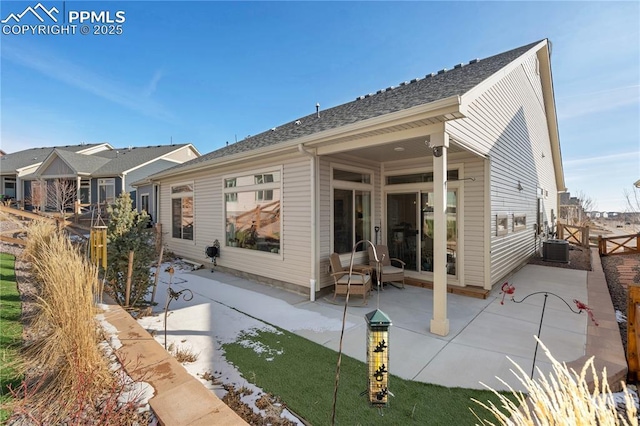 back of property with a patio area