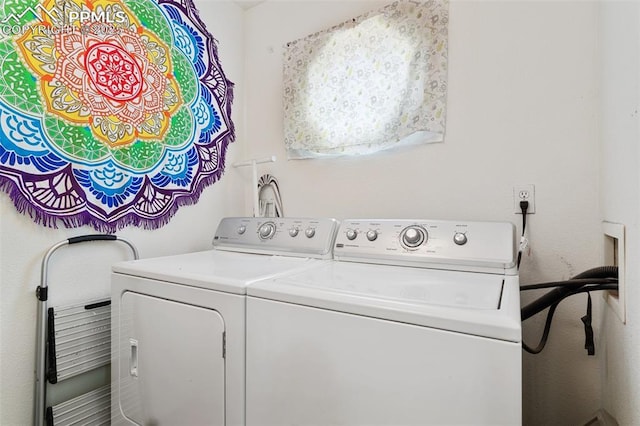 laundry room featuring laundry area and washer and dryer