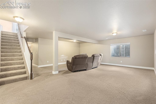 living room featuring light carpet, stairs, baseboards, and a textured ceiling