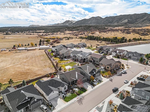 aerial view featuring a residential view and a mountain view