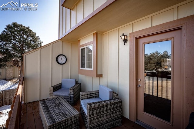 doorway to property with board and batten siding