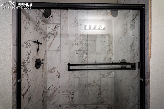 bathroom featuring a stall shower