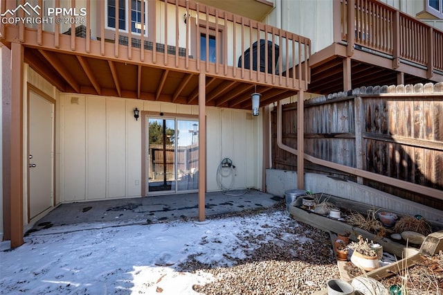 view of patio / terrace featuring a balcony and fence