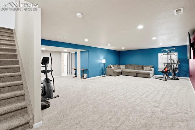 carpeted living room featuring recessed lighting, visible vents, and baseboards