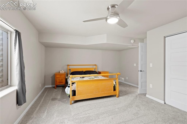 bedroom featuring carpet flooring, a ceiling fan, and baseboards