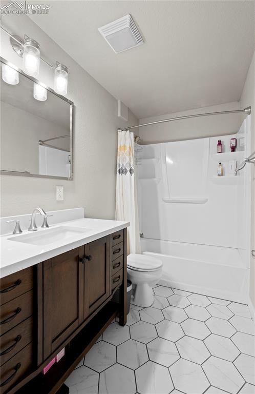 full bath featuring toilet, visible vents, shower / bath combination with curtain, and vanity