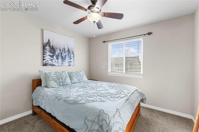 bedroom with carpet, ceiling fan, and baseboards