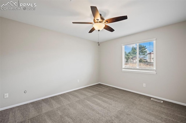 empty room with a ceiling fan, carpet, visible vents, and baseboards