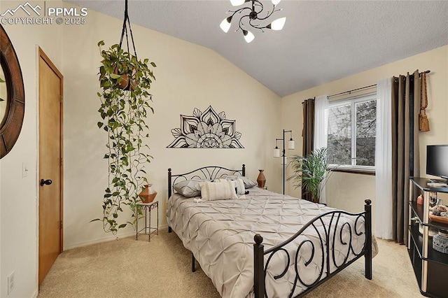 bedroom featuring light carpet, a notable chandelier, vaulted ceiling, and a textured ceiling