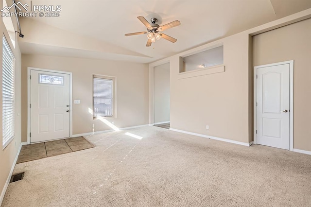 foyer featuring carpet, visible vents, ceiling fan, and baseboards