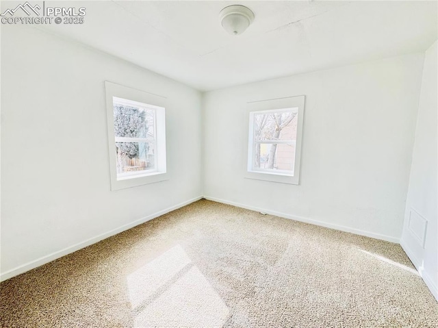 1108 W 16th St, Pueblo, CO 81003 - carpeted spare room with baseboards