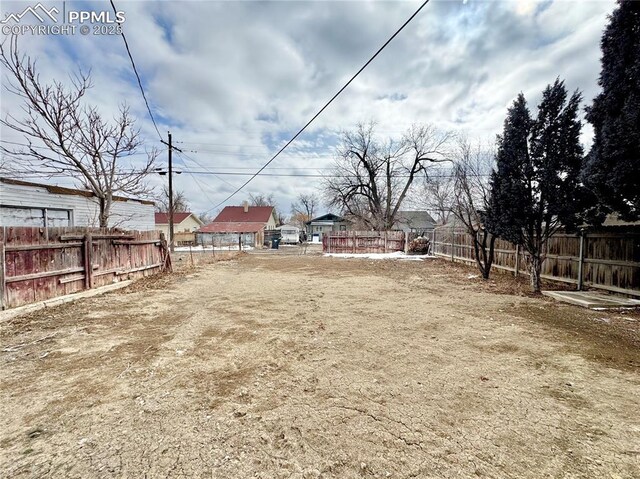 1108 W 16th St, Pueblo, CO 81003 - view of yard with fence and a residential view