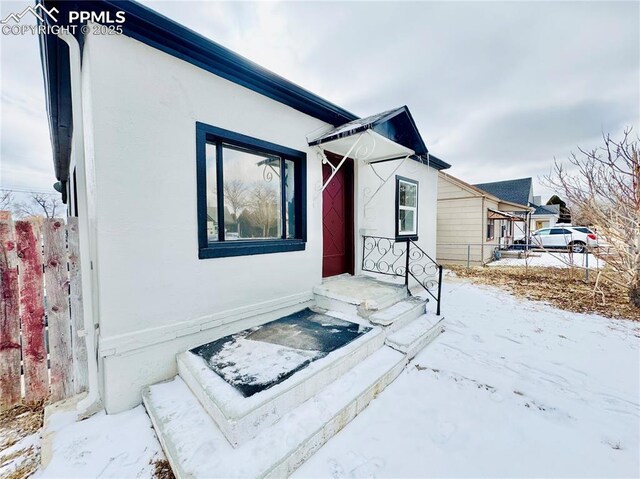 1108 W 16th St, Pueblo, CO 81003 - view of front of home featuring stucco siding